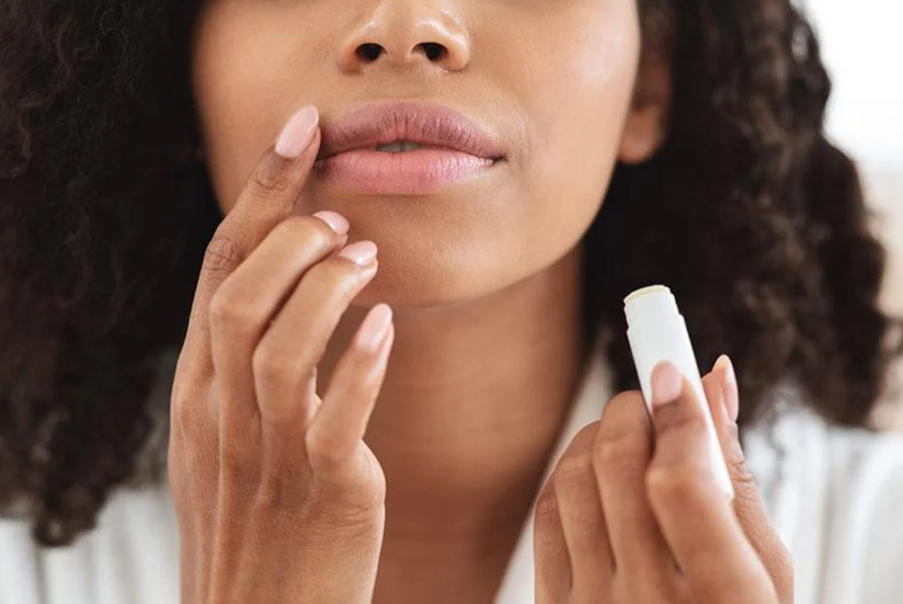 Woman with Lip Balm